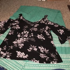 floral design shirt with cross and sleeve cut out